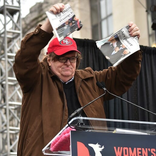 Michael Moore Rips Up a Copy of Washington Post at Women's March