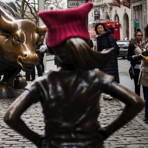 Statue of Little Girl Stares Down Wall Street's Charging Bull