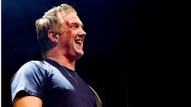 Josh Homme Apologizes After Kicking Photographer in the Face at Christmas Show