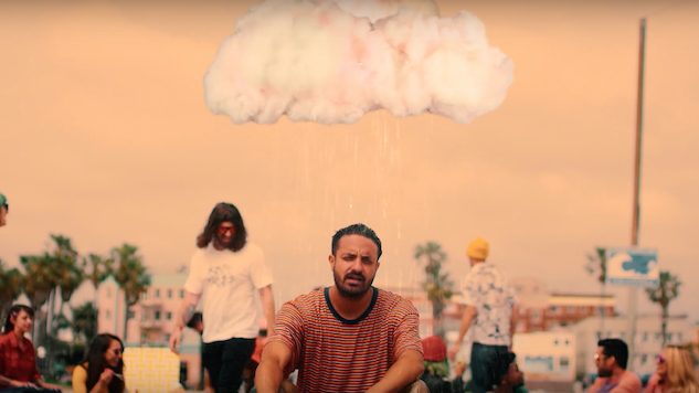 Watch Young the Giant’s Trippy, Rain-Filled Video for “Heat of the Summer”